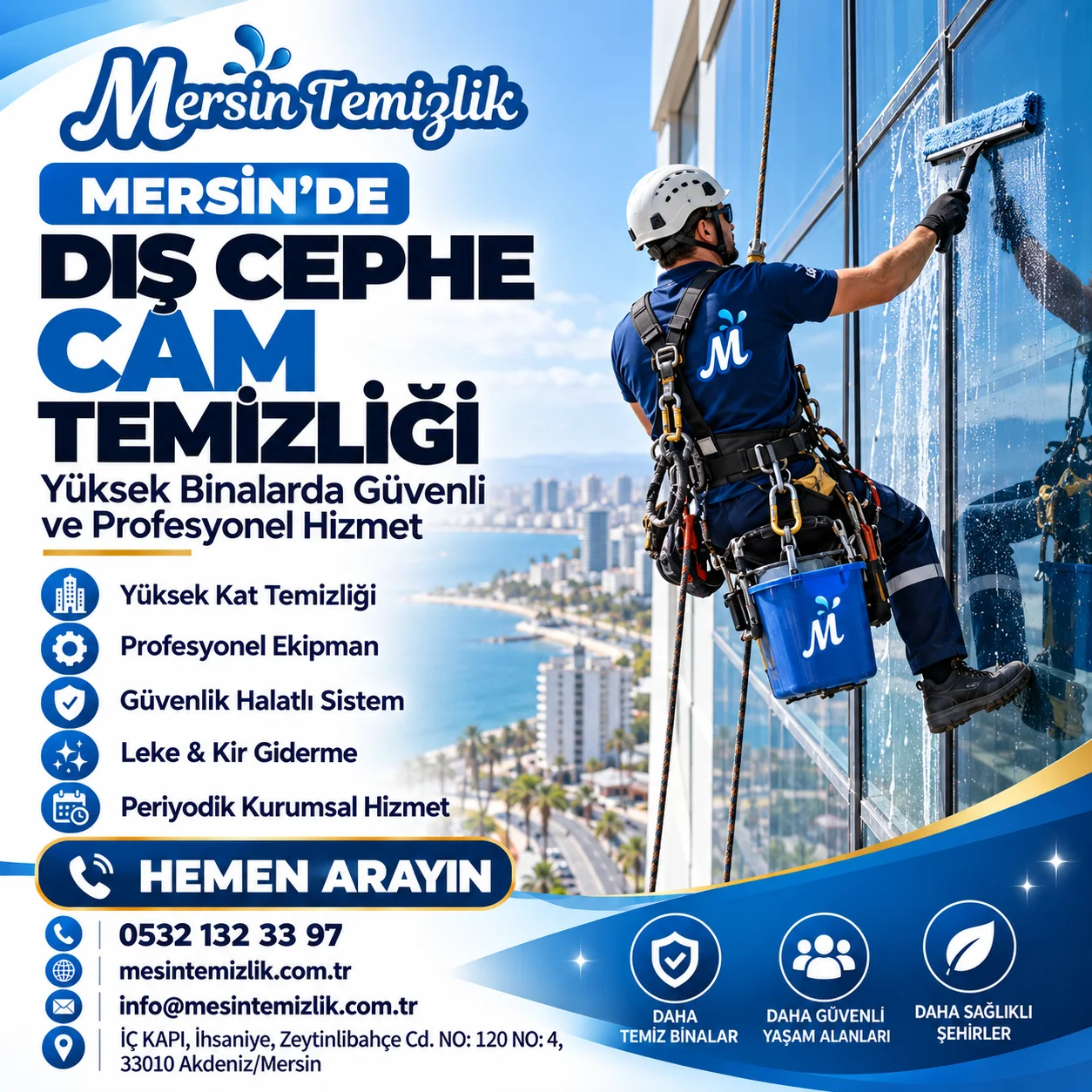 Mersin’de güvenlik ekipmanıyla dış cephe cam temizliği yapan personel